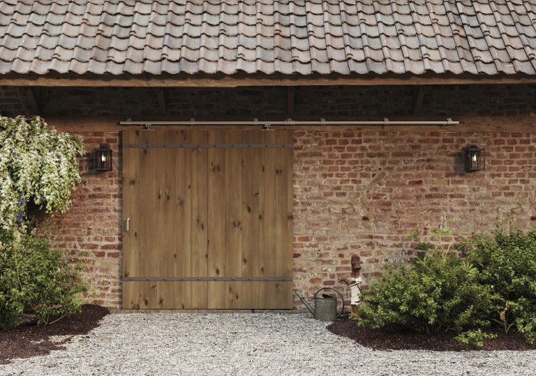 Von Rollapparat bis Stopper: Alles über Schiebetorbeschläge